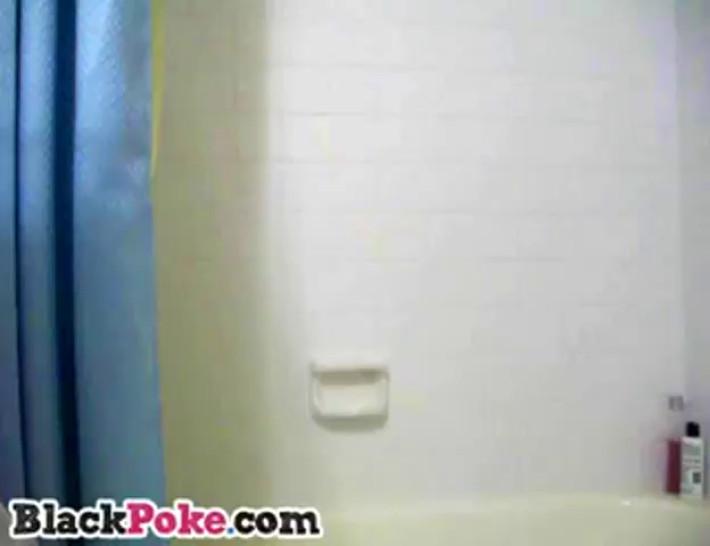 Chubby ebony babe with big tits takes a shower