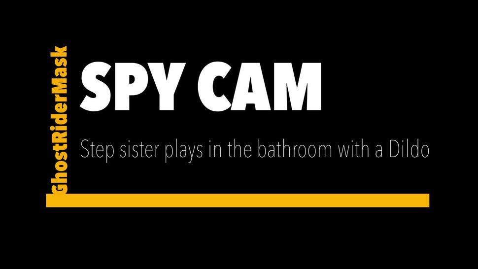Step sis plays in the bathroom with a Dildo. Spy cam
