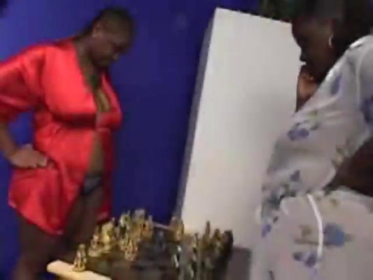 two chubby black chess player don't wanna play on board