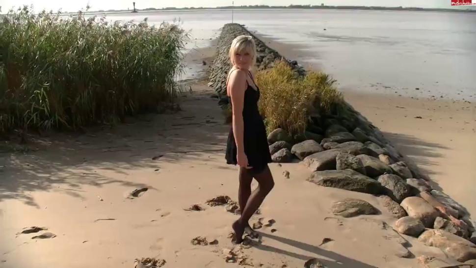 Gorgeous blonde fucked by the river