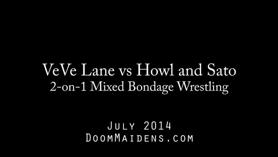 Bondage wrestling - one woman against two men