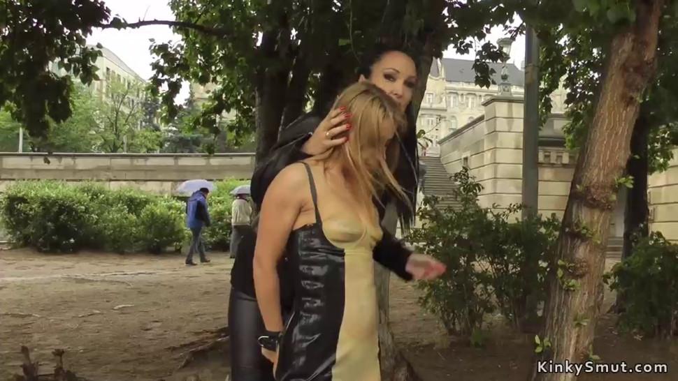 Anal slut in rubber dress in public