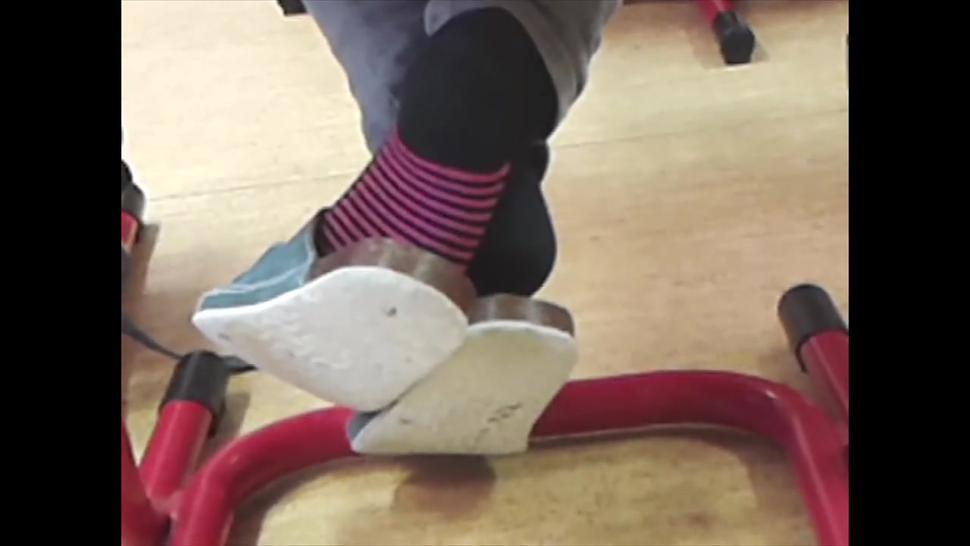 Adela's school shoeplay under chair with birkenstocks