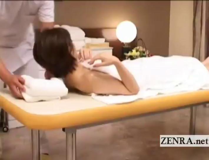 Japanese milf lies nude for sensual erotic oil massage