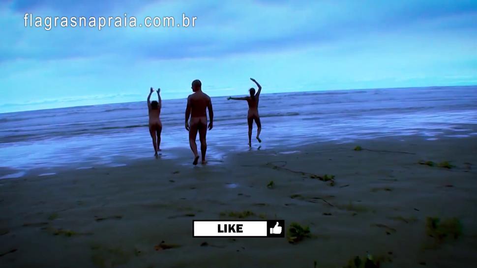 Naked swinging couples on public beach - Brazil