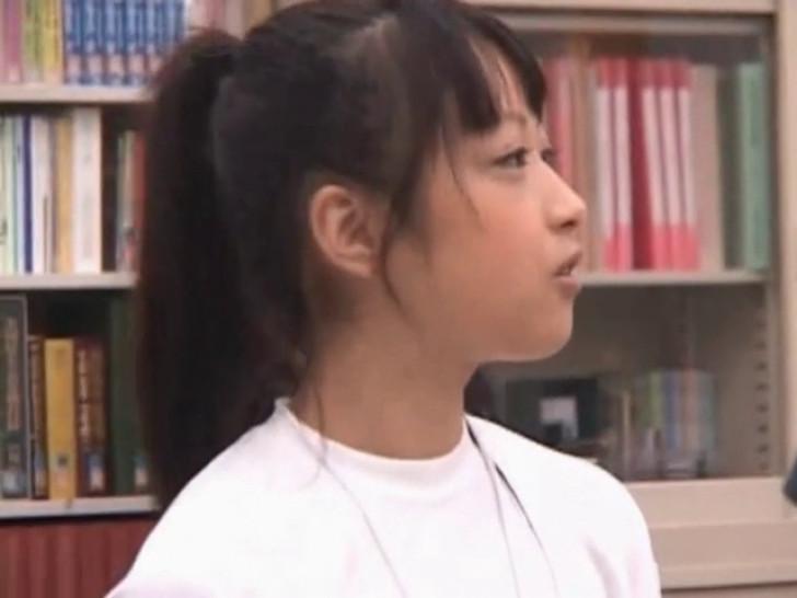 Cute asian teen girl teased in the school library