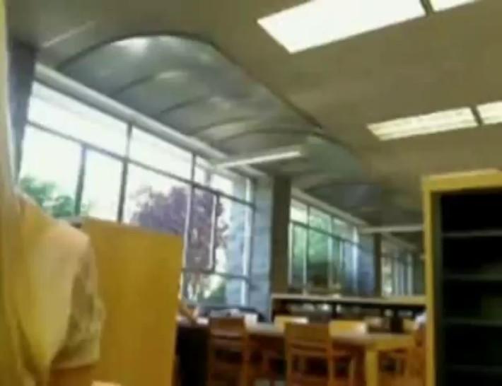 Busty blonde flashes, toys and squirts in a public library