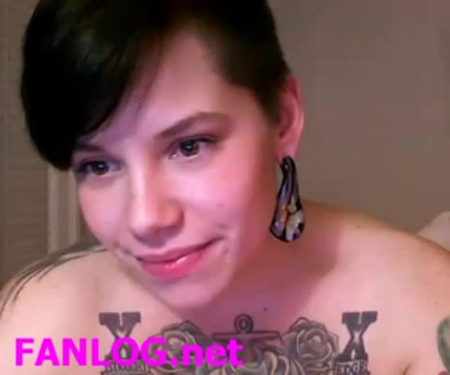 Tattooed girl and her webcam show