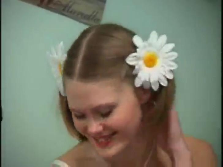Teen fucked with flowers in her hair