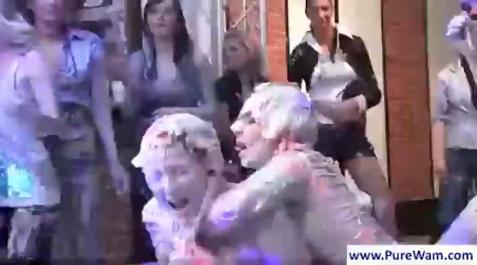 Cute lesbians fight in mud at a party