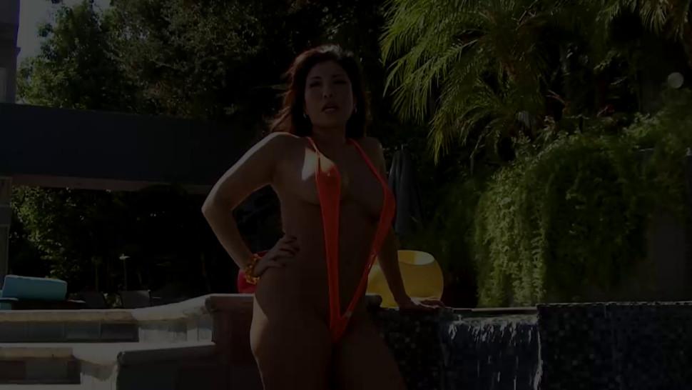 Sensual Asian vixen stripping in the pool