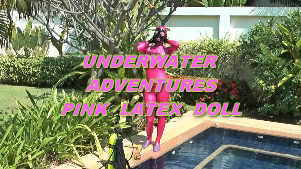 Veronica in pink latex catsuit scuba diving