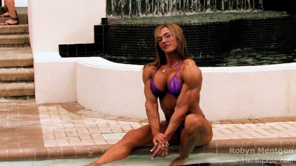 Sexy muscle babe Robin flexes her hot hard body in the pool