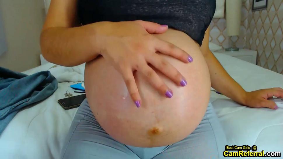 Pregnant Latina Shows Off Her Stomach And Tits