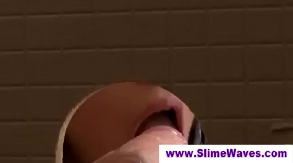 Glory hole fake cock gets babe wet and messy