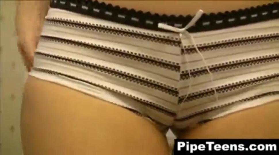 Hidden cam video of a sexy blonde teen stripping at a hotel