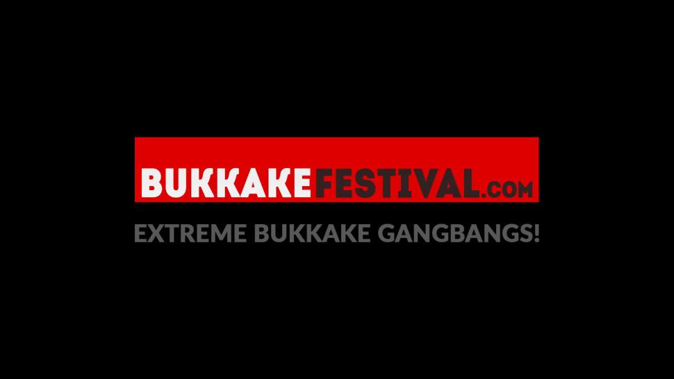 BUKKAKE FESTIVAL - Redhead mature smiles while sucking cocks in a bukkake party