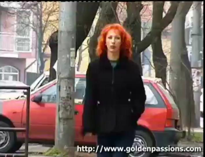 Mature redhead taking a piss in a public park - video 1