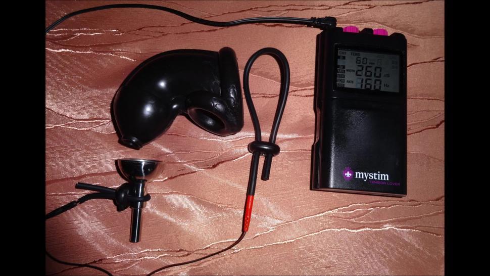 Estim electro dick milking with rubber penis sleeve