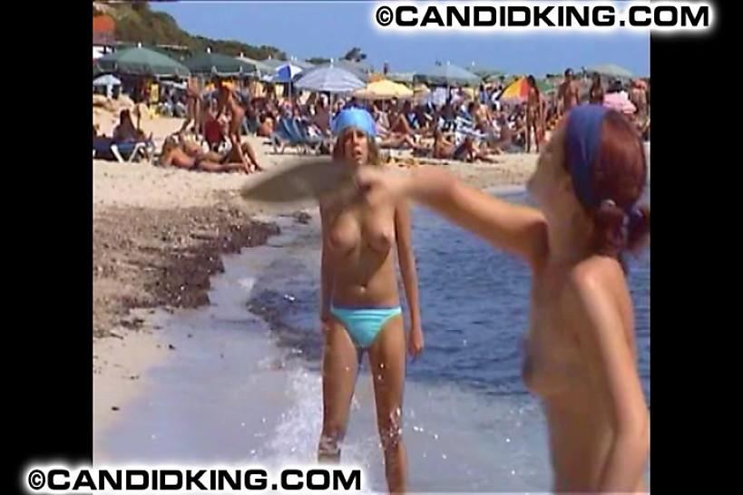 Hot sexy candid girls topless showing boobs on the beach!