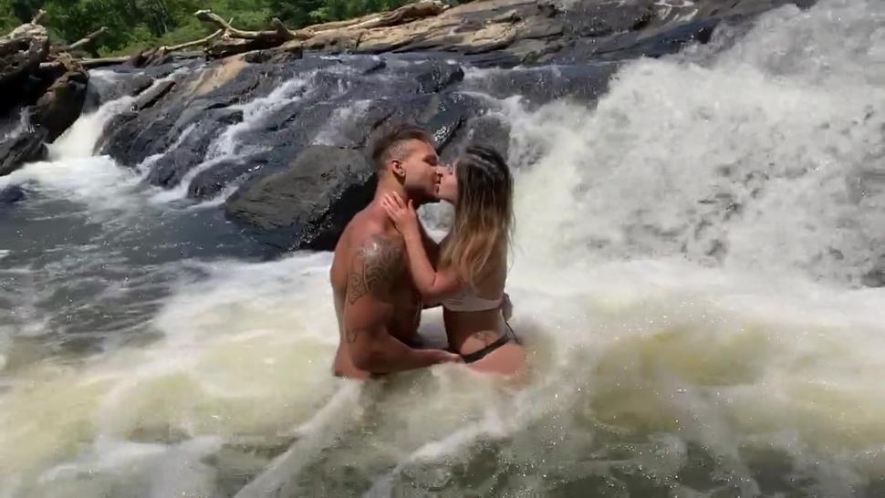 Outdoor waterfall makeout session