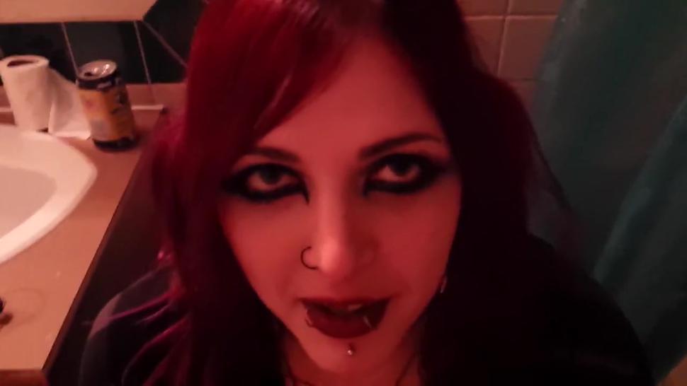 Short but sweet clip of young redhead goth girl giving smokey blowjob