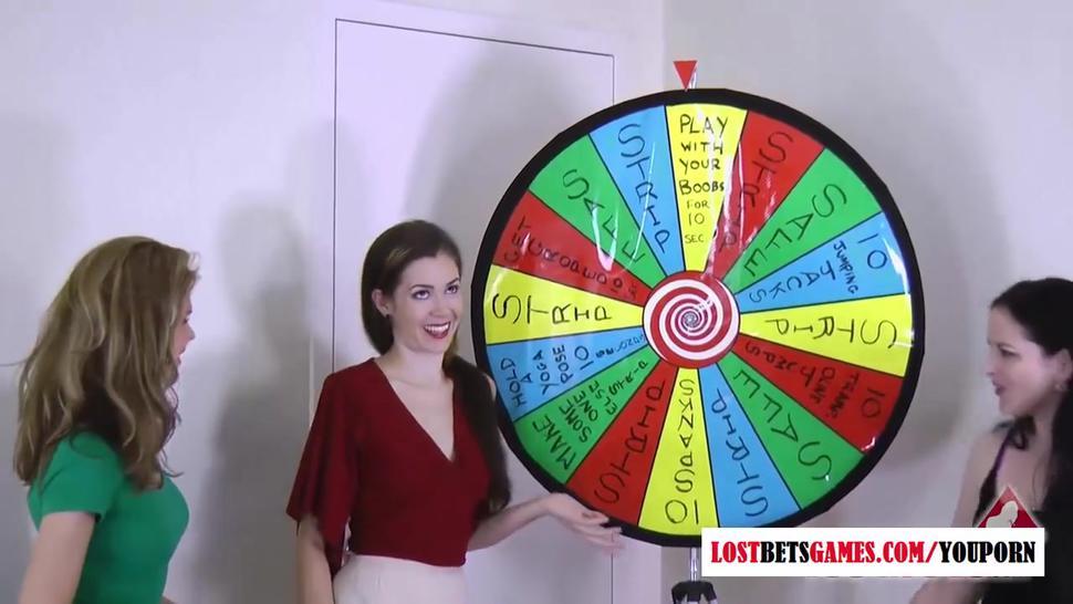 3 very hot girls play a game of strip spin the wheel