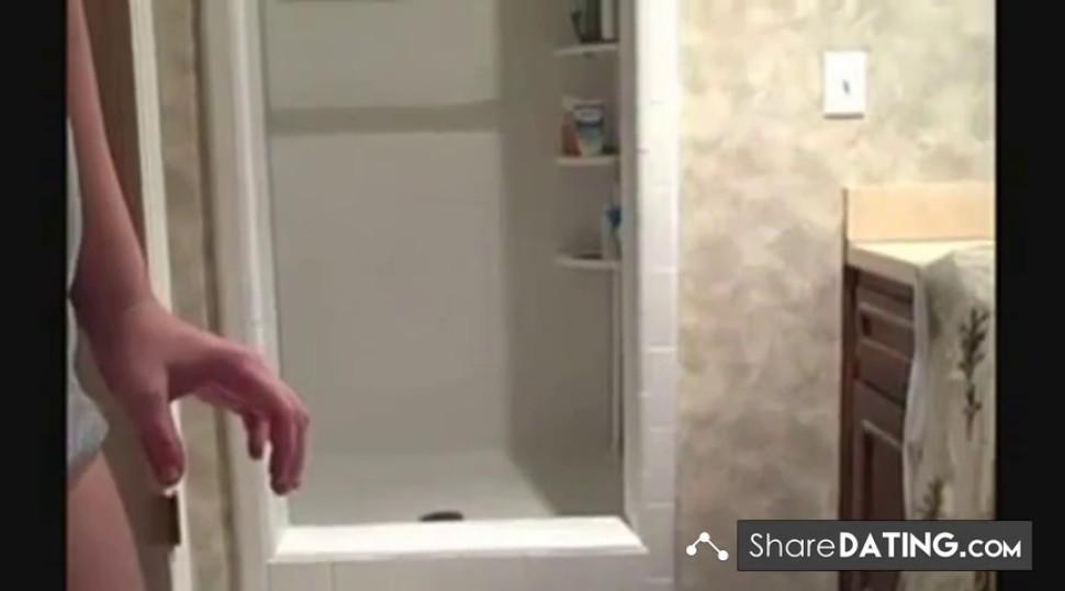 Hot milf cleaning the shower showing her ass