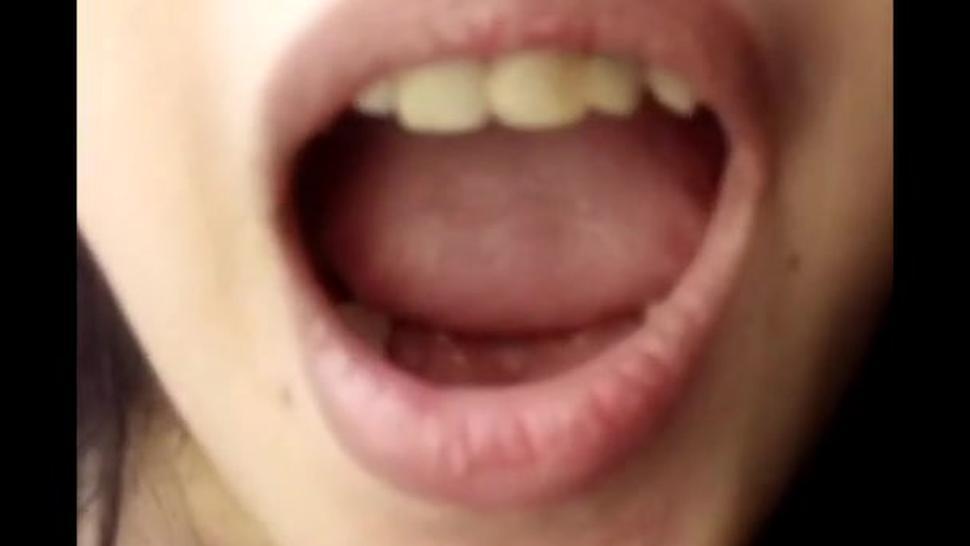 Philippino girl in saudi arabia opening her mouth
