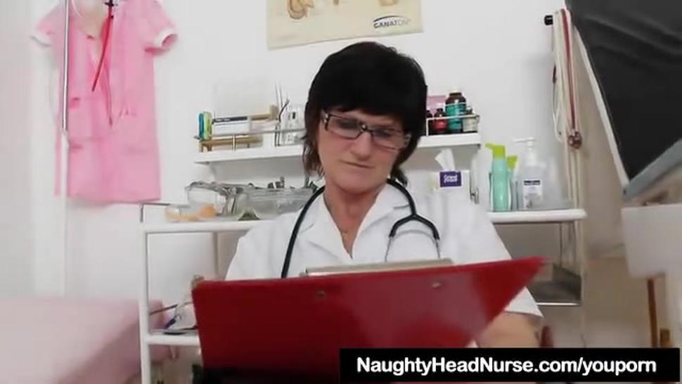 Brunette medic examining her pussy