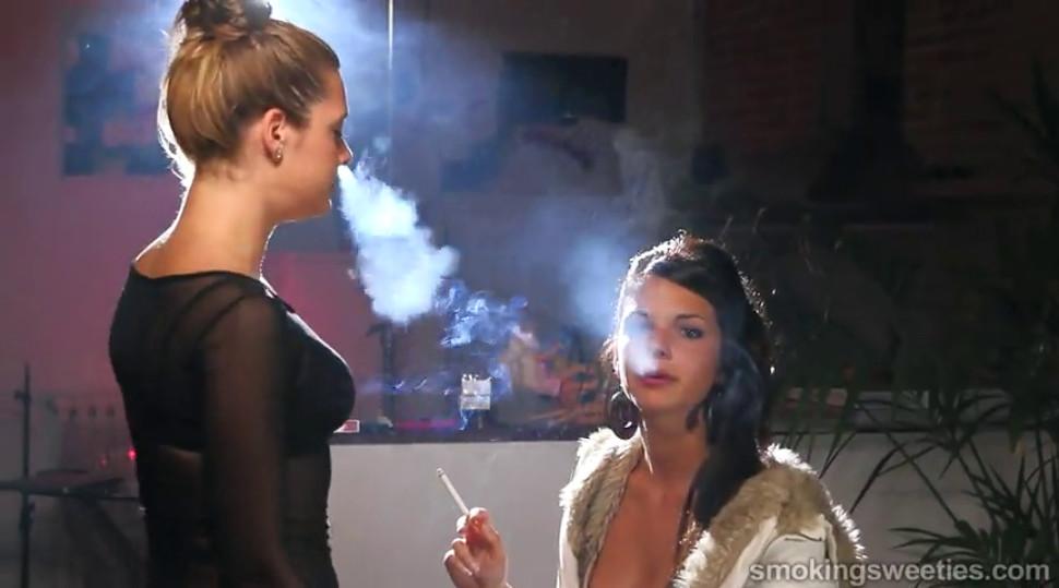 Sexy girl perfecting her smoking