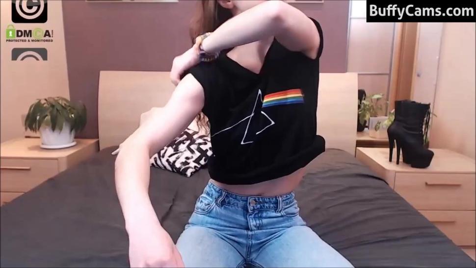 female muscle flexing on webcam