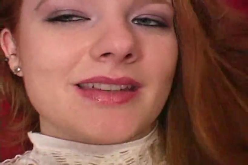 Horny redhead masturbates her pussy close-up