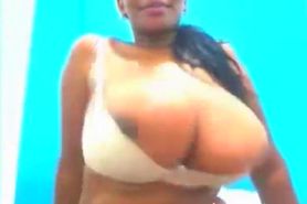 Hot ebony with monster tits teasing