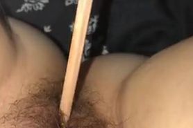 Girl shoved pencil up her pussy