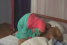 Arab lady wakes sleeping neighbor