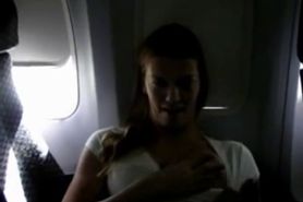 Hot blonde masturbates on a commercial flight