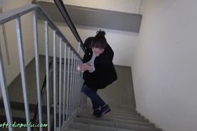 Fiddle cuffed girl climbs stairs