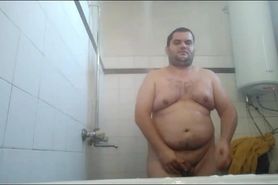 Sexy chubby guy taking a shower