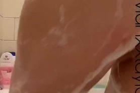 PAWG Brunette cleans herself in the tub