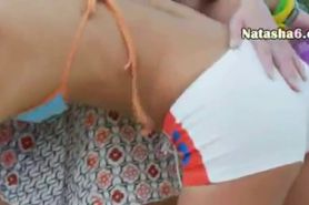 lesbians fingering holes on beach - video 2