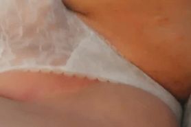 Playing with my pussy under my white lace panties
