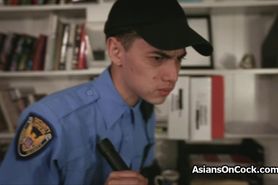 Asian cutie shakes butt on security guards cock
