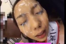 Asian bukkake cutie takes cum bath