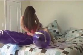 girl playing with worker balloons