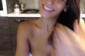 Skinny brunette shows her cute tits
