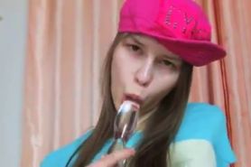 Busty teen Beata using glass dildo