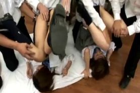 Horny Japanese teacher gets fucked and by her students in classroom