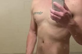 Jacking off in public pool bathroom waiting for someone to walk in.