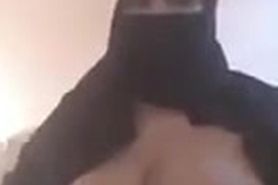 Naughty hijab flashes huge titts